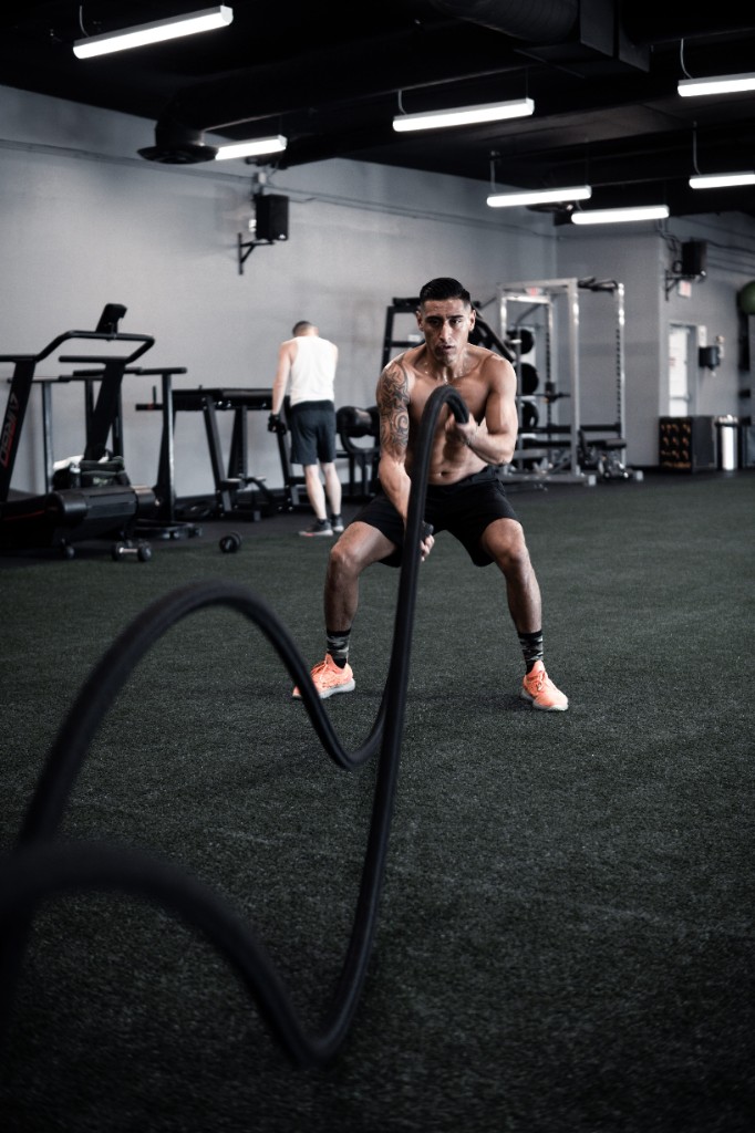 Ricky, speed and agility coach at RJJ Athletics, training with battle ropes